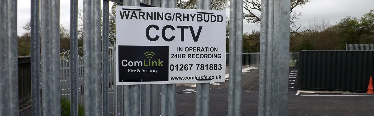 CCTV warning sign on the security fencing